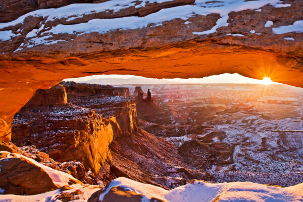 sandstone arch and sunsrise in winter